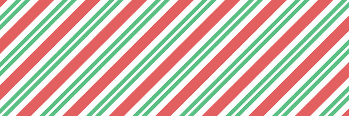 Vector Christmas background with diagonal stripes pattern, candy cane. Long horizontal banner.