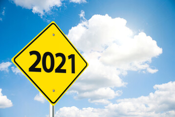 Road sign 2021 on sky