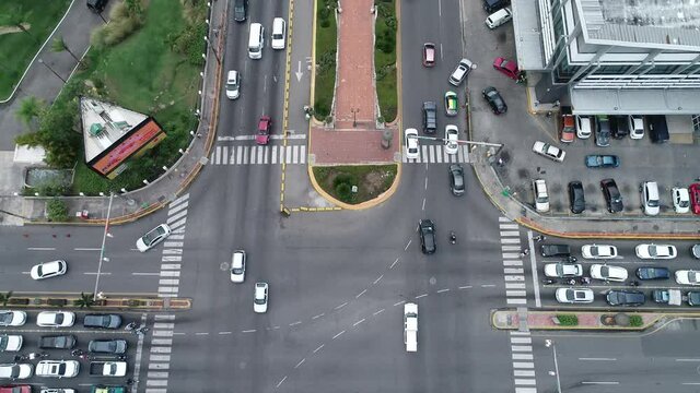 Aerial tilt-up reveal of Santo Domingo Avenue and car traffic. Dominican Republic