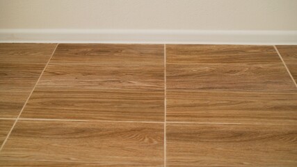 The tiles are in wood color. Wood tile texture background