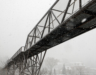 bridge over the river in the snow