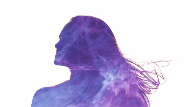 Female silhouette. Ethereal energy. Double exposure neon glow purple blue mist motion in peaceful woman profile isolated on white copy space background. Spiritual enlightenment. Esoteric recreation.