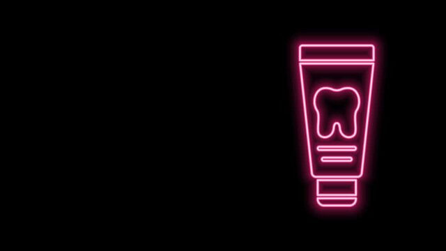 Glowing neon line Tube of toothpaste icon isolated on black background. 4K Video motion graphic animation