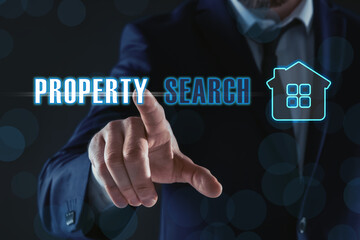 Property search concept. Man using virtual screen with house illustration, closeup