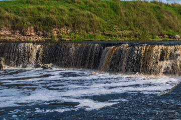 A stormy river with a brown hue.