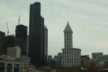 Seattle city skyscrapers. Modern architecture. High commercial buildings. Cloudy day.