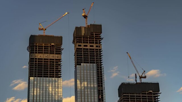work of cranes on the construction of high-rise buildings, time lapse