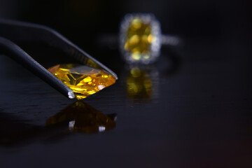 
A shiny yellow gem
In the gemstone clip
