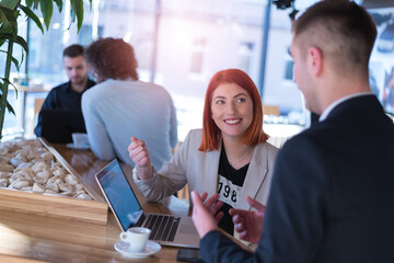 Startup Diversity Teamwork Brainstorming Meeting Concept. Business Team Coworkers discussing and Working Planning Start Up inside modern Cafe bar