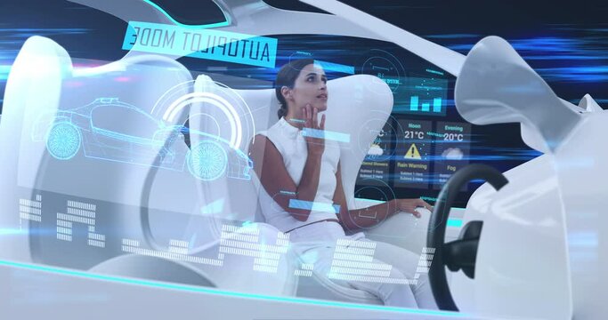 Woman using digital tablet in car with white interiors in autopilot mode driving across city