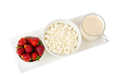 Healthy nutrition. Dairy products, fresh strawberries. Photo