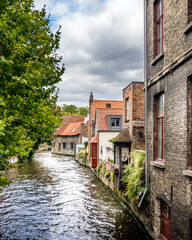 Fototapeta na wymiar Historic Buildings along he Canals of the Medieval City of Bruges in Belgium