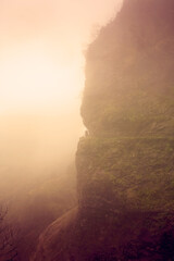 Foggy mountain that can represent danger.