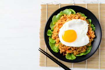 Korean food, Kimchi fried rice with fried egg on top, Top view