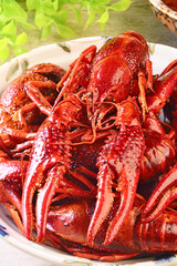A plate of cooked  chinese food spicy crayfish.  