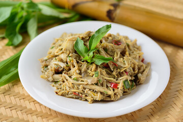 Northern Thai food (Yum Nor Mai), Spicy bamboo shoot salad with crab paste eating with basil and ginger leaf, Local Thai food