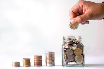 Coin in a bottle put money for business investment ideas, retirement and saving money for the future.