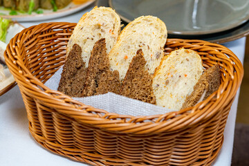 Black and white bread in a basket