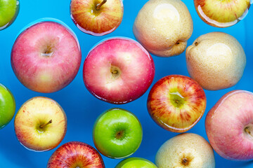 Washing fresh apples in the water