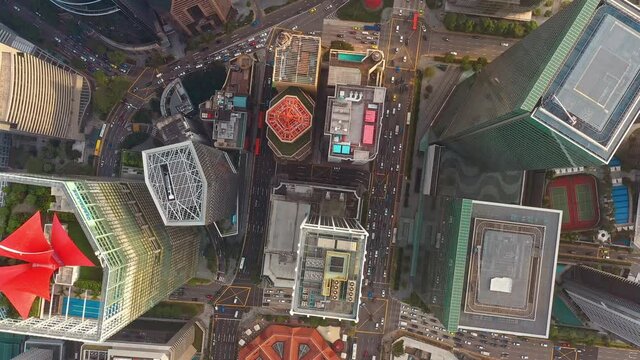 Skyscraper tower building, car traffic transportation in financial business district at Singapore city, drone aerial cityscape top view. City life, public transport, or commuter lifestyle concept