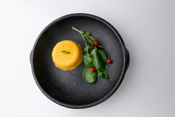 Brazilian Northeast Couscous (Cuscuz Nordestino). Maize couscous on white background