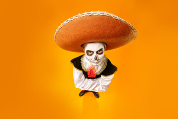 emotional boy with skull makeup