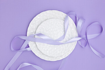 Purple satin ribbon and plate.