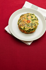 Korean food, korean pancake (Pajeon and Kimchi-jeon) on red background.