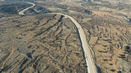 Israel Palestine border in Jerusalem Mountains- aerial view
drone image divide Ramot and Beit hanina (Abu Dahuk) neighborhoods northwest East Jerusalem 
