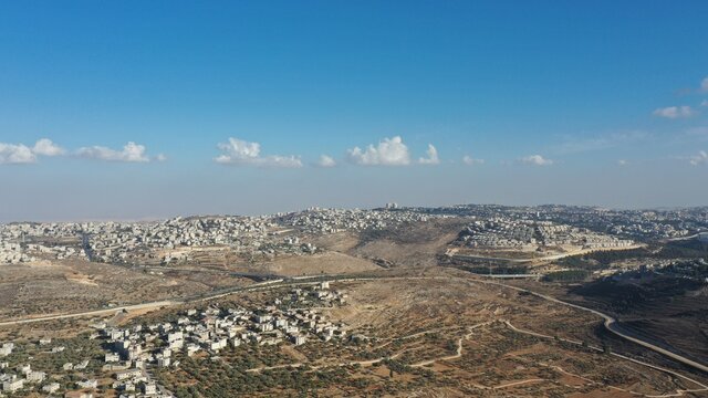 Israel Palestine border in Jerusalem - aerial view
drone image divide Beit hanina (Abu Dahuk) and Ramat Shlomo neighborhoods northwest East Jerusalem 
