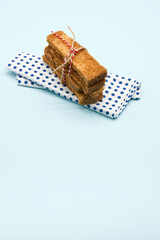 Bunch of rusks on blue background.