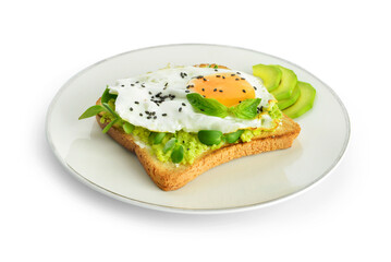 Sandwich with fried egg and avocado on plate against white background