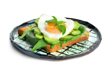 Sandwich with fried egg and avocado on plate against white background