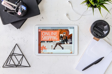 Composition with tablet computer on light background. Online shopping concept