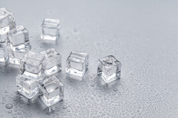 Ice cubes on grey background