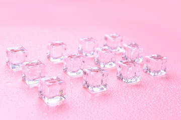 Ice cubes on color background