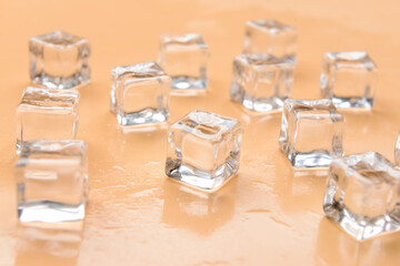 Ice cubes on color background