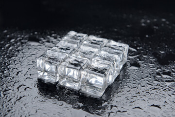 Ice cubes on dark background