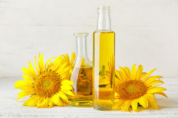 Bottles of sunflower oil on table