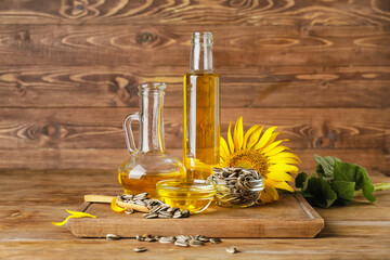 Obraz na płótnie Canvas Composition with sunflower oil on table