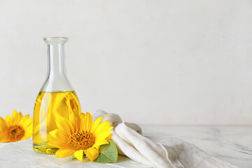 Bottle of sunflower oil on table