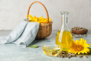 Composition with sunflower oil on table