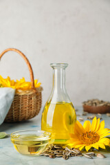 Composition with sunflower oil on table
