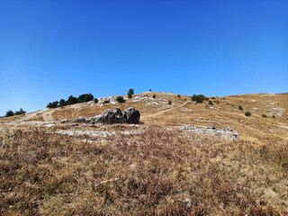 Stones in the mountains against the blue sky