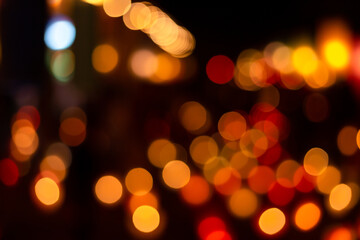 Fototapeta premium Christmas and Happy new year on blurred bokeh lights on black background.