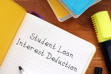 Student Loan Interest Deduction phrase on the piece of paper.