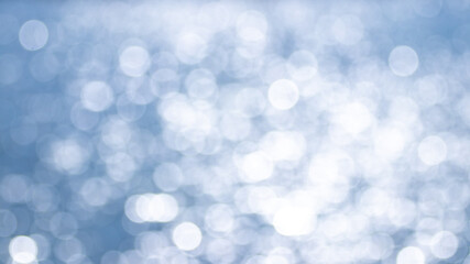 Abstract background with bokeh on a blue background