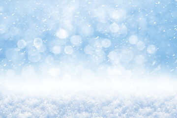 Winter abstract background with snow and blurred background with bokeh