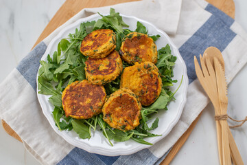 Homemade fried sweet potato cakes on a plate