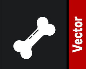 White Dog bone icon isolated on black background. Pets food symbol. Vector.